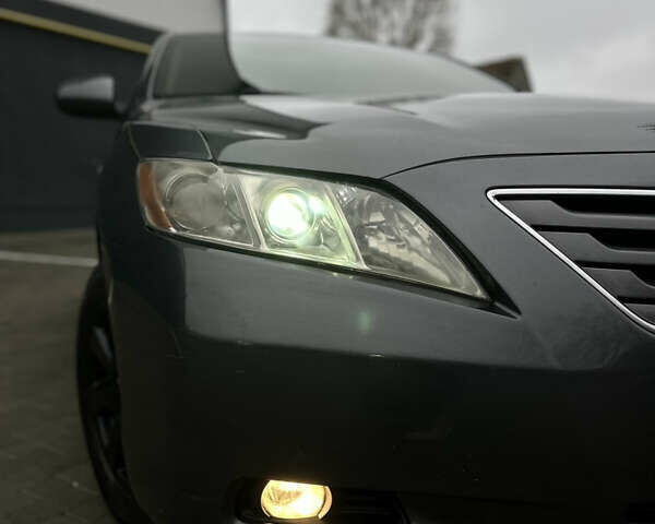 Черный Тойота Камри, объемом двигателя 2.4 л и пробегом 350 тыс. км за 6500 $, фото 11 на Automoto.ua