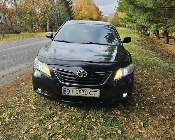 Чорний Тойота Камрі, об'ємом двигуна 2.36 л та пробігом 251 тис. км за 8900 $, фото 10 на Automoto.ua