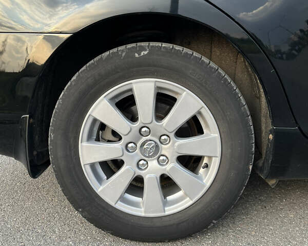 Черный Тойота Камри, объемом двигателя 2.4 л и пробегом 249 тыс. км за 9700 $, фото 2 на Automoto.ua