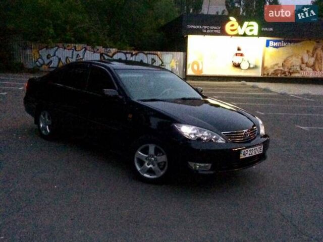 Чорний Тойота Камрі, об'ємом двигуна 2.36 л та пробігом 270 тис. км за 6100 $, фото 4 на Automoto.ua