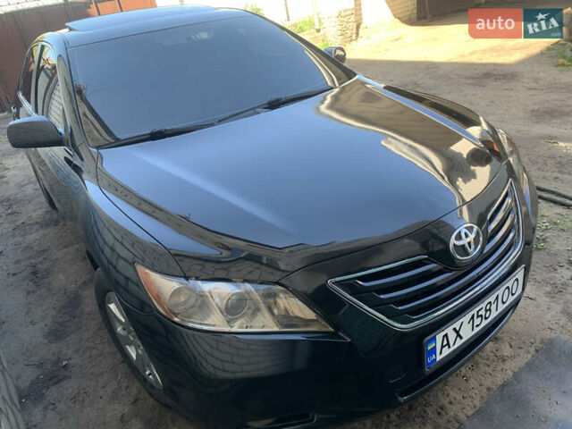 Черный Тойота Камри, объемом двигателя 3.5 л и пробегом 325 тыс. км за 7999 $, фото 60 на Automoto.ua