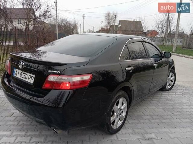 Чорний Тойота Камрі, об'ємом двигуна 2.4 л та пробігом 288 тис. км за 7700 $, фото 5 на Automoto.ua