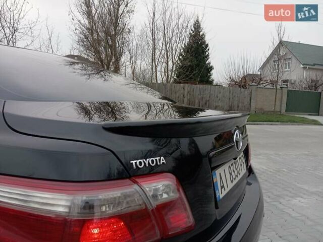Чорний Тойота Камрі, об'ємом двигуна 2.4 л та пробігом 288 тис. км за 7700 $, фото 4 на Automoto.ua