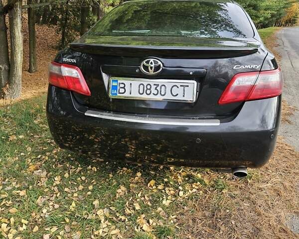 Чорний Тойота Камрі, об'ємом двигуна 2.36 л та пробігом 251 тис. км за 8900 $, фото 6 на Automoto.ua