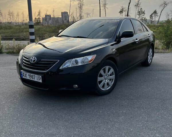 Черный Тойота Камри, объемом двигателя 2.4 л и пробегом 249 тыс. км за 9700 $, фото 6 на Automoto.ua