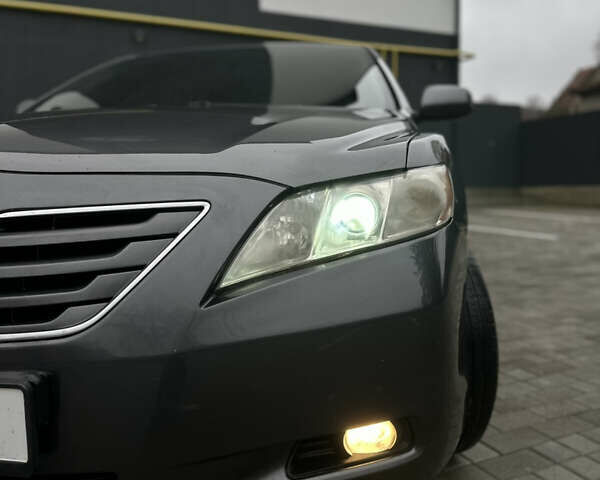 Черный Тойота Камри, объемом двигателя 2.4 л и пробегом 350 тыс. км за 6500 $, фото 12 на Automoto.ua