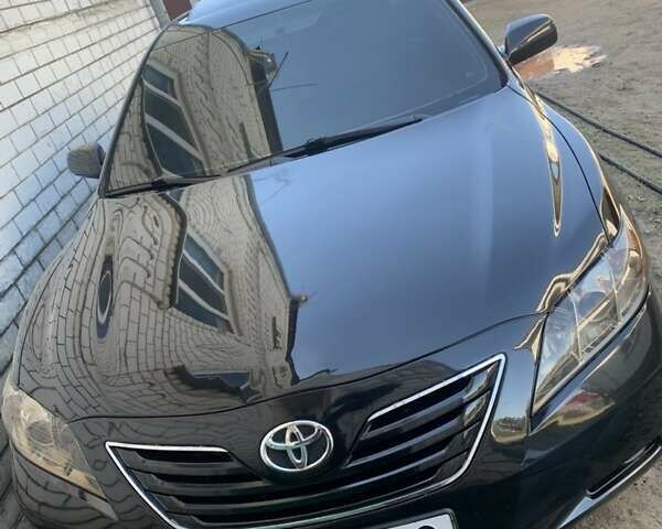 Черный Тойота Камри, объемом двигателя 3.5 л и пробегом 325 тыс. км за 7999 $, фото 64 на Automoto.ua