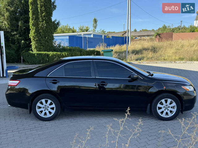 Черный Тойота Камри, объемом двигателя 3.46 л и пробегом 325 тыс. км за 7150 $, фото 7 на Automoto.ua