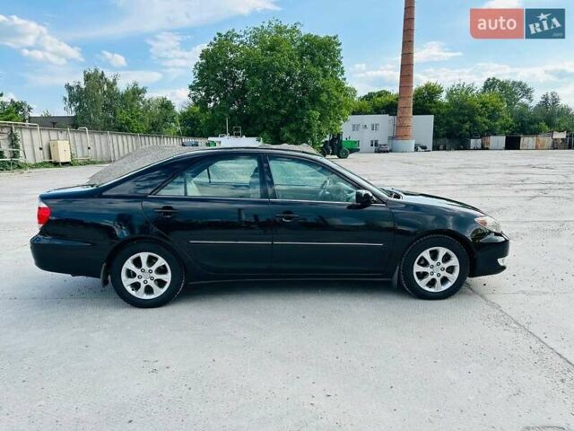 Черный Тойота Камри, объемом двигателя 3 л и пробегом 195 тыс. км за 6900 $, фото 1 на Automoto.ua