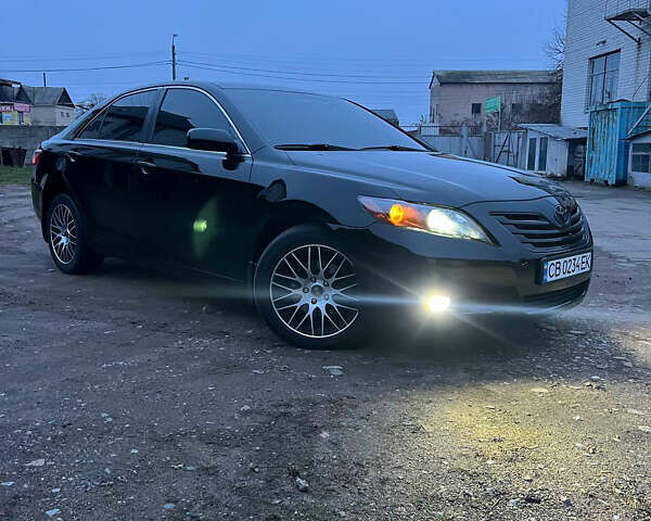 Черный Тойота Камри, объемом двигателя 3.46 л и пробегом 264 тыс. км за 9800 $, фото 1 на Automoto.ua