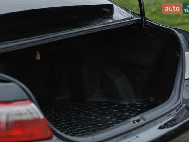 Черный Тойота Камри, объемом двигателя 3.46 л и пробегом 316 тыс. км за 9500 $, фото 28 на Automoto.ua