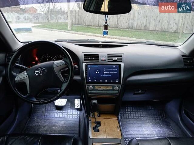 Чорний Тойота Камрі, об'ємом двигуна 2.4 л та пробігом 288 тис. км за 7700 $, фото 13 на Automoto.ua