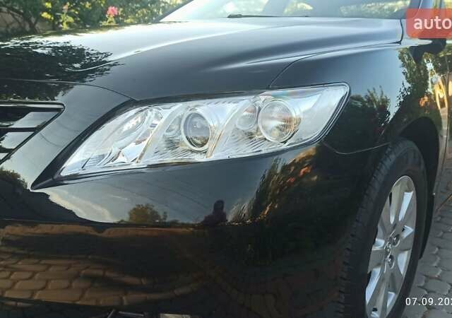 Чорний Тойота Камрі, об'ємом двигуна 2.36 л та пробігом 249 тис. км за 8150 $, фото 23 на Automoto.ua
