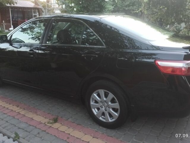 Черный Тойота Камри, объемом двигателя 2.4 л и пробегом 236 тыс. км за 7800 $, фото 4 на Automoto.ua