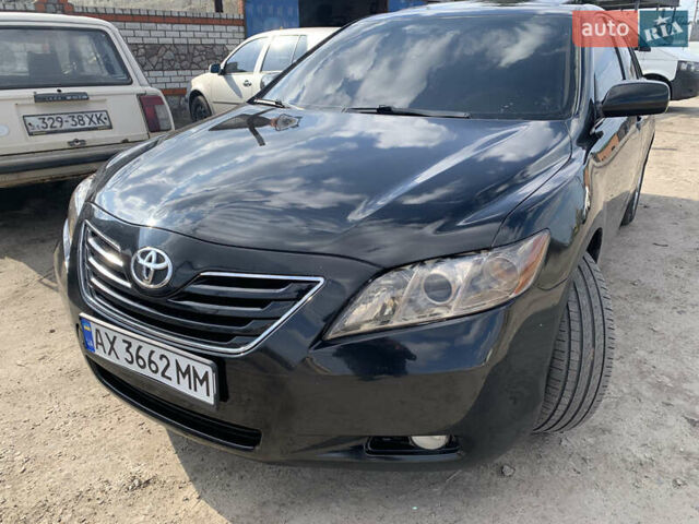 Черный Тойота Камри, объемом двигателя 3.5 л и пробегом 325 тыс. км за 7999 $, фото 54 на Automoto.ua