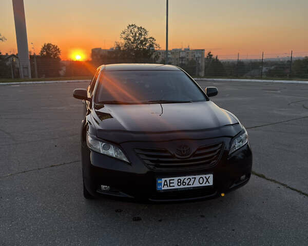 Черный Тойота Камри, объемом двигателя 2.4 л и пробегом 235 тыс. км за 7650 $, фото 40 на Automoto.ua