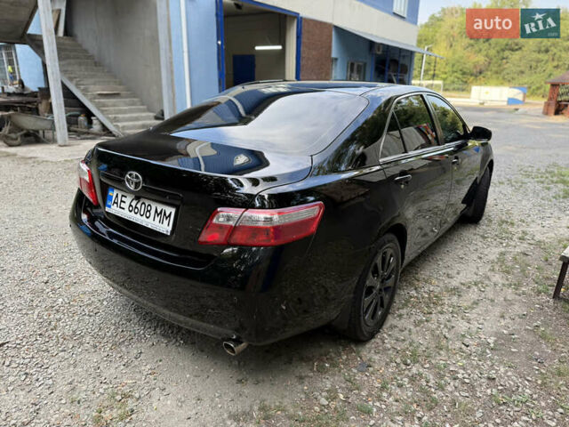 Черный Тойота Камри, объемом двигателя 2.36 л и пробегом 300 тыс. км за 7600 $, фото 6 на Automoto.ua