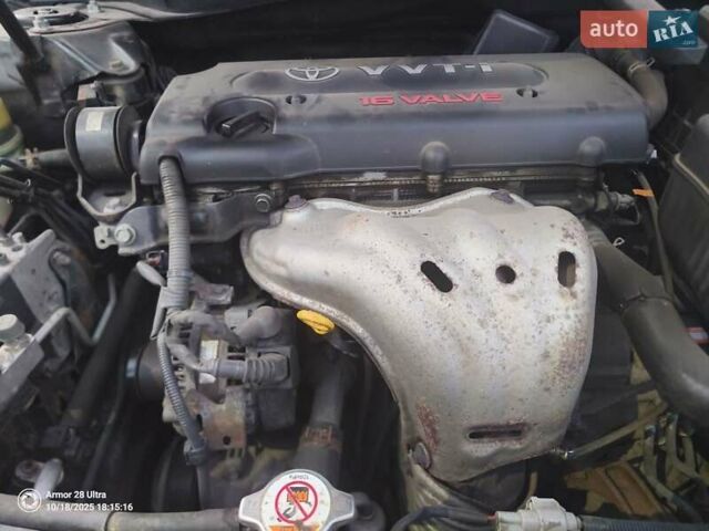 Черный Тойота Камри, объемом двигателя 2.36 л и пробегом 230 тыс. км за 10000 $, фото 22 на Automoto.ua