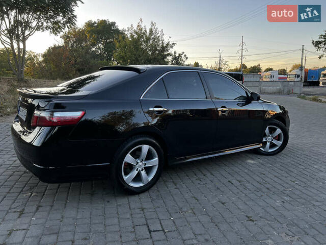 Черный Тойота Камри, объемом двигателя 3.5 л и пробегом 285 тыс. км за 10400 $, фото 6 на Automoto.ua