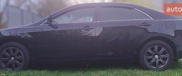 Черный Тойота Камри, объемом двигателя 2.36 л и пробегом 230 тыс. км за 10000 $, фото 2 на Automoto.ua