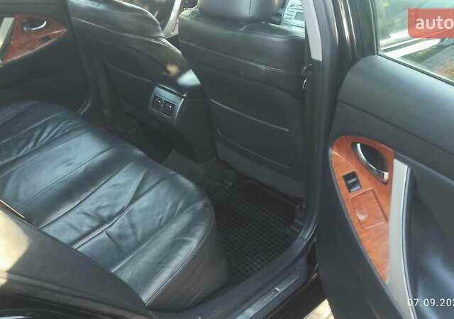 Чорний Тойота Камрі, об'ємом двигуна 2.36 л та пробігом 249 тис. км за 8150 $, фото 9 на Automoto.ua