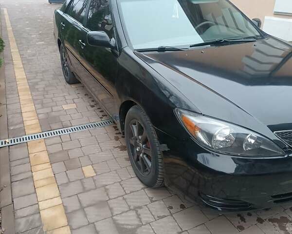 Черный Тойота Камри, объемом двигателя 0 л и пробегом 250 тыс. км за 4350 $, фото 1 на Automoto.ua