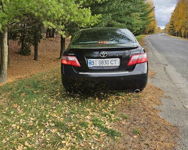 Чорний Тойота Камрі, об'ємом двигуна 2.36 л та пробігом 251 тис. км за 8900 $, фото 8 на Automoto.ua