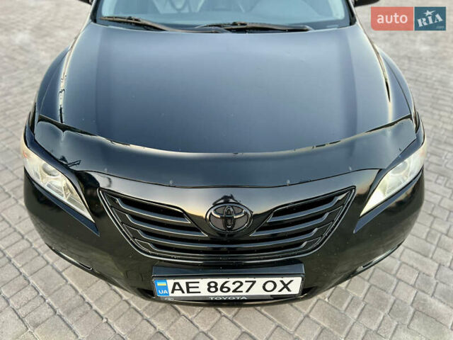 Черный Тойота Камри, объемом двигателя 2.4 л и пробегом 235 тыс. км за 7499 $, фото 6 на Automoto.ua
