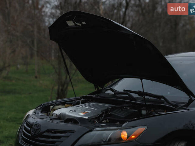 Черный Тойота Камри, объемом двигателя 3.46 л и пробегом 316 тыс. км за 9500 $, фото 49 на Automoto.ua