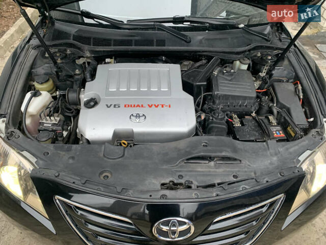 Черный Тойота Камри, объемом двигателя 3.5 л и пробегом 325 тыс. км за 7999 $, фото 22 на Automoto.ua