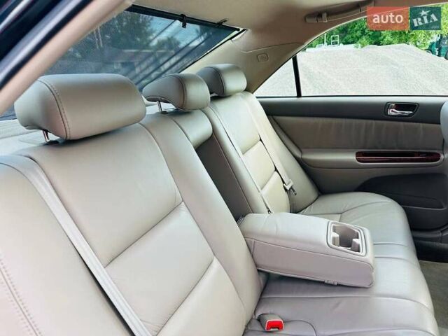 Черный Тойота Камри, объемом двигателя 3 л и пробегом 195 тыс. км за 6900 $, фото 20 на Automoto.ua