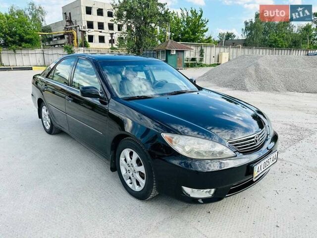 Черный Тойота Камри, объемом двигателя 3 л и пробегом 195 тыс. км за 6900 $, фото 6 на Automoto.ua