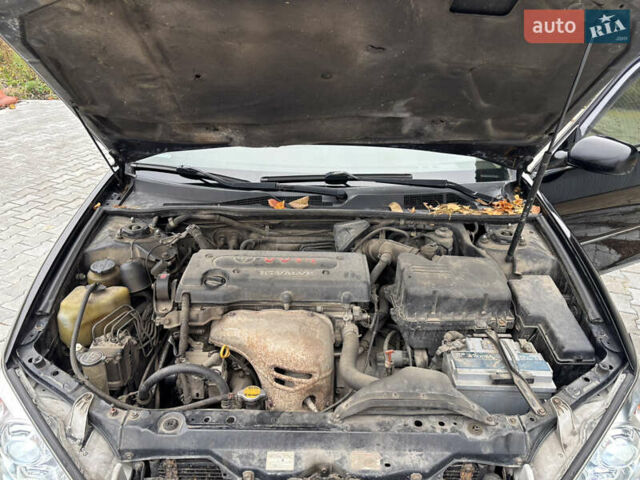 Чорний Тойота Камрі, об'ємом двигуна 2.36 л та пробігом 294 тис. км за 5100 $, фото 15 на Automoto.ua