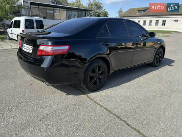 Черный Тойота Камри, объемом двигателя 3.46 л и пробегом 320 тыс. км за 6900 $, фото 13 на Automoto.ua