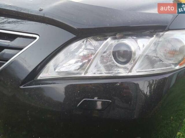 Черный Тойота Камри, объемом двигателя 2.36 л и пробегом 230 тыс. км за 10000 $, фото 18 на Automoto.ua