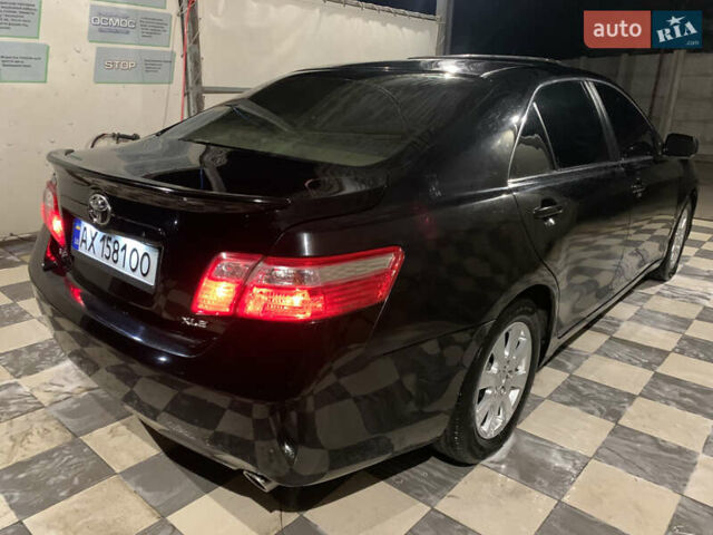 Черный Тойота Камри, объемом двигателя 3.5 л и пробегом 325 тыс. км за 7999 $, фото 68 на Automoto.ua