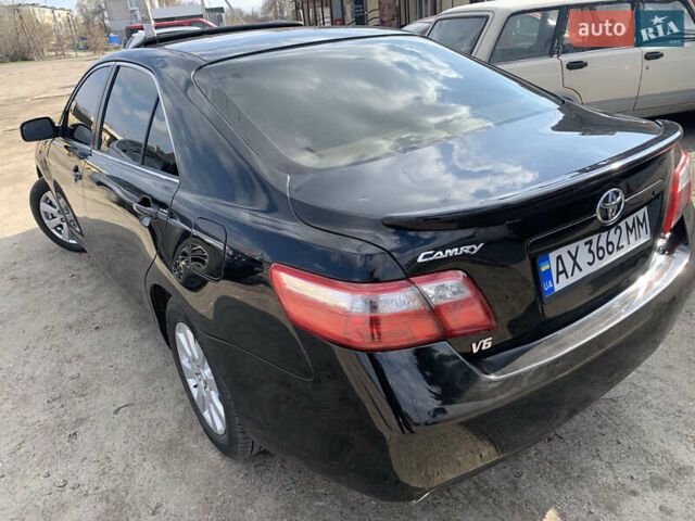 Черный Тойота Камри, объемом двигателя 3.5 л и пробегом 325 тыс. км за 7999 $, фото 53 на Automoto.ua