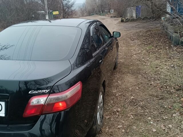 Чорний Тойота Камрі, об'ємом двигуна 2.4 л та пробігом 260 тис. км за 8000 $, фото 2 на Automoto.ua