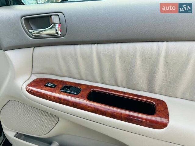 Черный Тойота Камри, объемом двигателя 3 л и пробегом 195 тыс. км за 6900 $, фото 19 на Automoto.ua