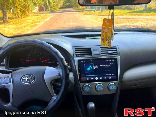 Чорний Тойота Камрі, об'ємом двигуна 2.4 л та пробігом 380 тис. км за 7499 $, фото 3 на Automoto.ua