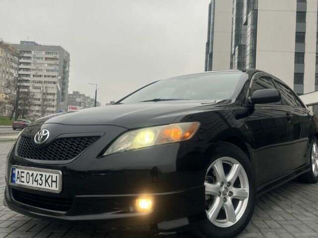 Черный Тойота Камри, объемом двигателя 2.4 л и пробегом 184 тыс. км за 8500 $, фото 1 на Automoto.ua
