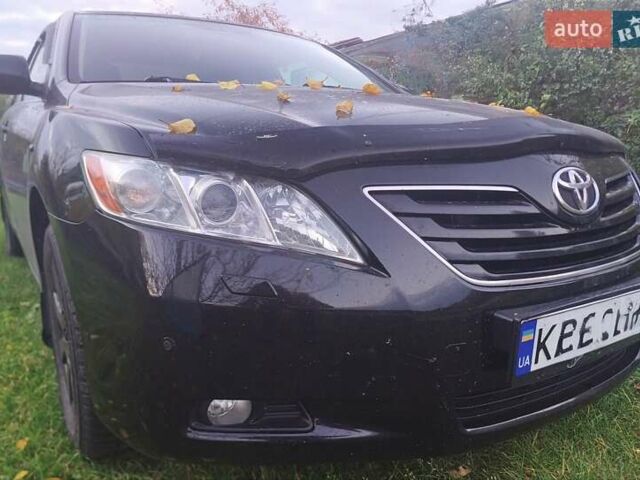 Черный Тойота Камри, объемом двигателя 2.36 л и пробегом 230 тыс. км за 10000 $, фото 3 на Automoto.ua