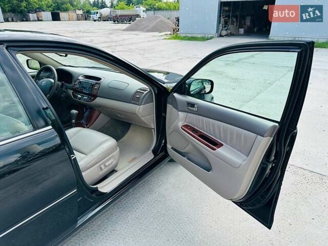 Черный Тойота Камри, объемом двигателя 3 л и пробегом 195 тыс. км за 6900 $, фото 9 на Automoto.ua