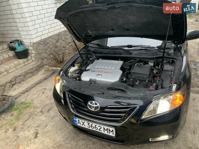Черный Тойота Камри, объемом двигателя 3.5 л и пробегом 325 тыс. км за 7999 $, фото 29 на Automoto.ua