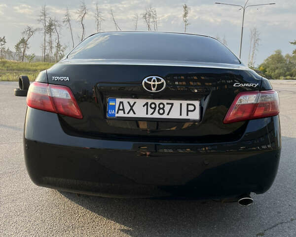 Черный Тойота Камри, объемом двигателя 2.4 л и пробегом 249 тыс. км за 9700 $, фото 12 на Automoto.ua