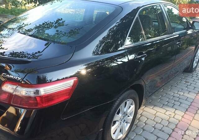 Чорний Тойота Камрі, об'ємом двигуна 2.36 л та пробігом 249 тис. км за 8150 $, фото 2 на Automoto.ua