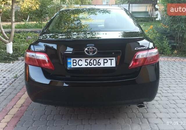 Чорний Тойота Камрі, об'ємом двигуна 2.36 л та пробігом 249 тис. км за 8150 $, фото 17 на Automoto.ua