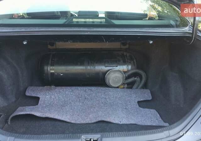 Чорний Тойота Камрі, об'ємом двигуна 2.36 л та пробігом 249 тис. км за 8150 $, фото 12 на Automoto.ua