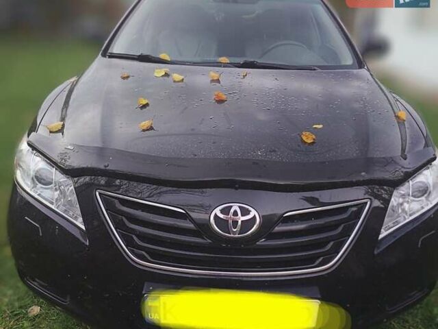 Черный Тойота Камри, объемом двигателя 2.36 л и пробегом 230 тыс. км за 10000 $, фото 34 на Automoto.ua