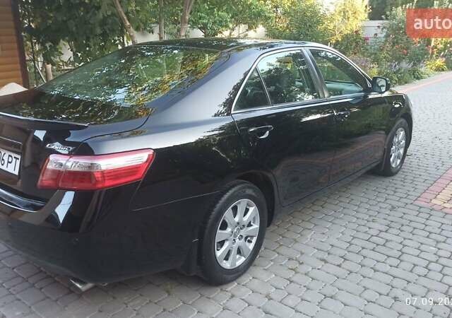 Чорний Тойота Камрі, об'ємом двигуна 2.36 л та пробігом 249 тис. км за 8150 $, фото 19 на Automoto.ua